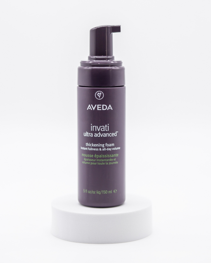 Aveda invati ultra advanced thickening foam bottle on a white background.